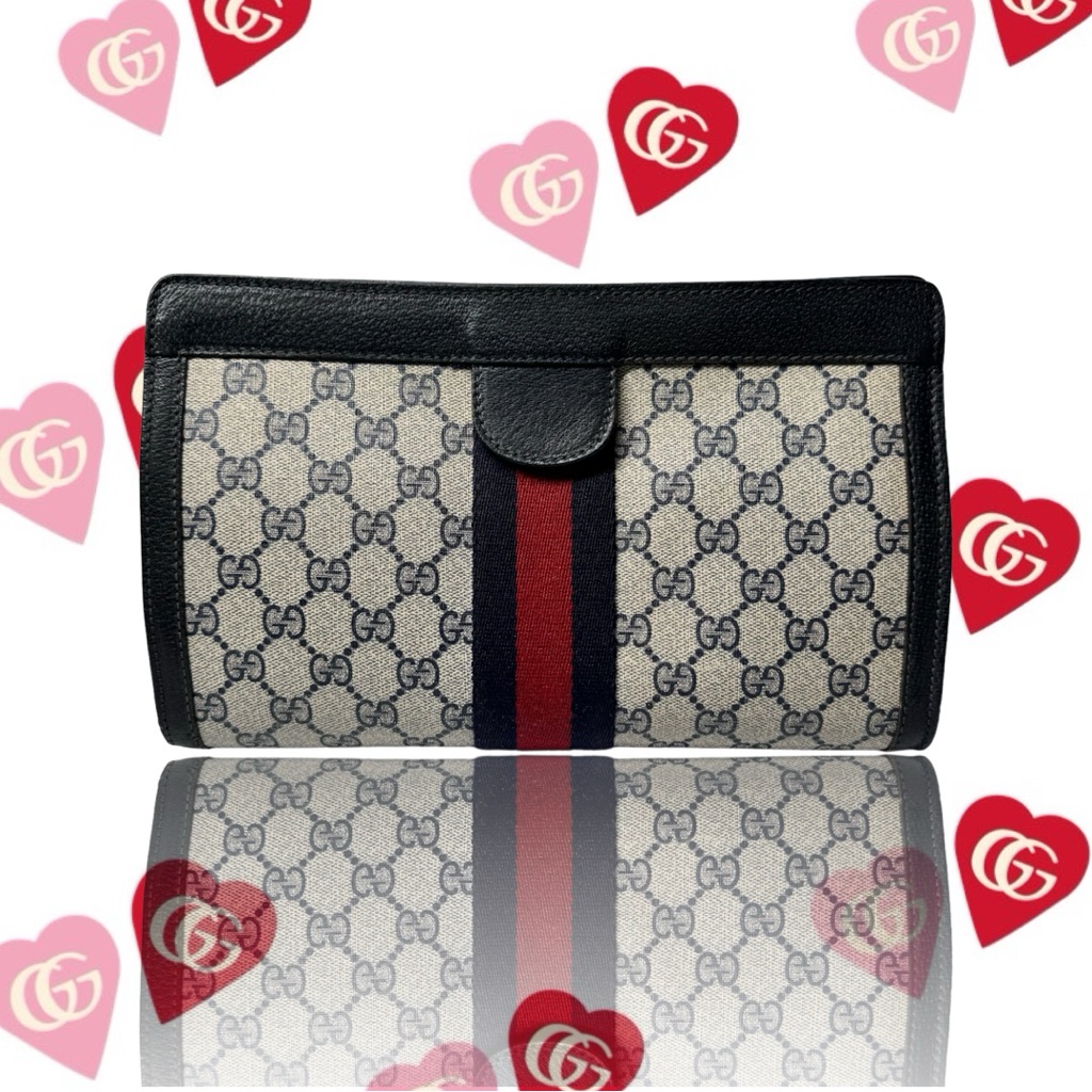 Gucci Gg Monogram Supreme Vintage Clutch